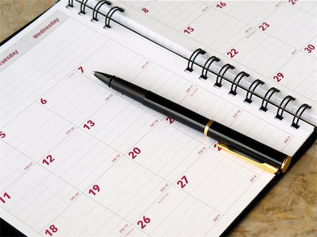 monthly planner with pen on the table Photographie de stock - Aubaine LD & Abonnement, Code: 400-05276628