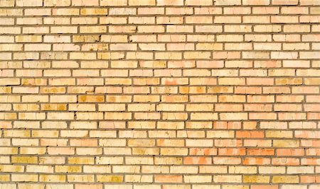 simsearch:400-05337615,k - Yellow red brick  wall background. Many old bricks . Photographie de stock - Aubaine LD & Abonnement, Code: 400-05277355