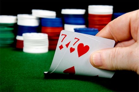 simsearch:400-04795607,k - Pair of sevens opening hand at Poker (From a series of opening hands at poker) Stock Photo - Budget Royalty-Free & Subscription, Code: 400-05277476