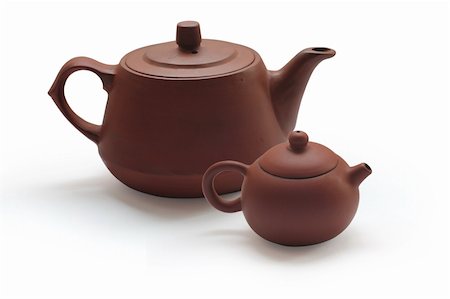 Clay teapots isolated on white background Photographie de stock - Aubaine LD & Abonnement, Code: 400-05277639