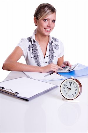 Businesswoman sitting at table with documents and calculator isolated on white Foto de stock - Super Valor sin royalties y Suscripción, Código: 400-05277642