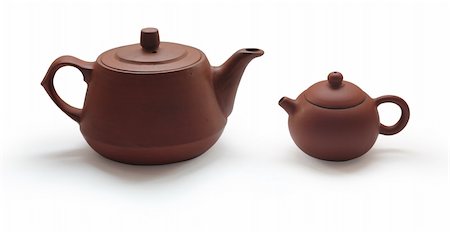 Clay teapots isolated on white background Photographie de stock - Aubaine LD & Abonnement, Code: 400-05277664