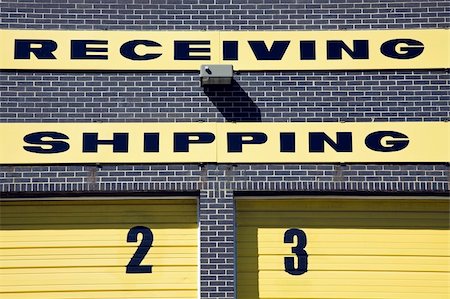 factory loading docks - Receiving and Shipping - signs on the warehouse. Stock Photo - Budget Royalty-Free & Subscription, Code: 400-05277801