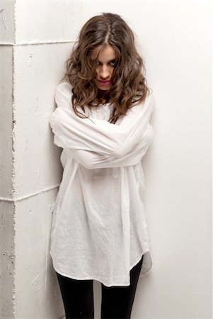 Young insane woman with straitjacket standing looking at camera Photographie de stock - Aubaine LD & Abonnement, Code: 400-05277896