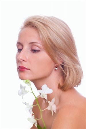 beautiful woman with white flower Foto de stock - Royalty-Free Super Valor e Assinatura, Número: 400-05278083