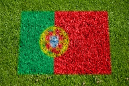 fairplay - flag of portugal on grass with spray Stockbilder - Microstock & Abonnement, Bildnummer: 400-05278438