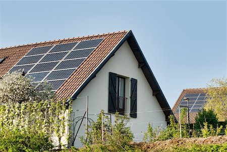 raphtong (artist) - solar or photovoltaic panels on a roof Fotografie stock - Microstock e Abbonamento, Codice: 400-05278447