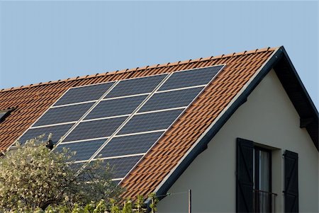 raphtong (artist) - solar or photovoltaic panels on a roof Fotografie stock - Microstock e Abbonamento, Codice: 400-05278448