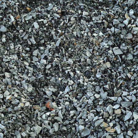 simsearch:400-05270612,k - A blanket of river pepple stones in direct sunlight. Photographie de stock - Aubaine LD & Abonnement, Code: 400-05278566