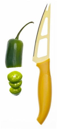 simsearch:400-04300930,k - Sliced Jalapeno Pepper with Modern Shaped Knife. Photographie de stock - Aubaine LD & Abonnement, Code: 400-05278830