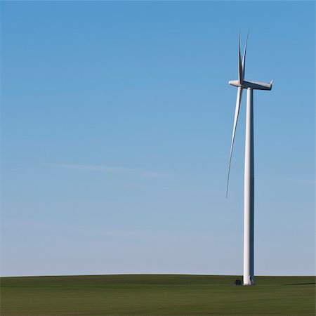 A wind turbine sprouts out of a wheat field in south east Washington State, USA. Stock Photo - Budget Royalty-Free & Subscription, Code: 400-05279710