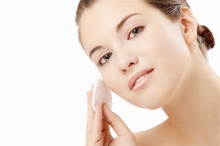 simsearch:400-06137895,k - Young woman clears a face skin, isolated Foto de stock - Super Valor sin royalties y Suscripción, Código: 400-05279780