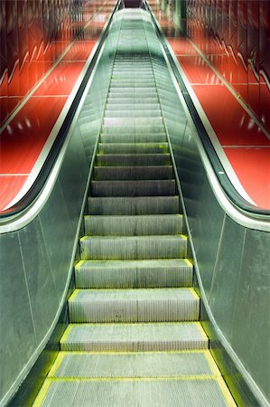 simsearch:400-05093259,k - Escalators and red tiles with diminishing perspective Stock Photo - Budget Royalty-Free & Subscription, Code: 400-05270005