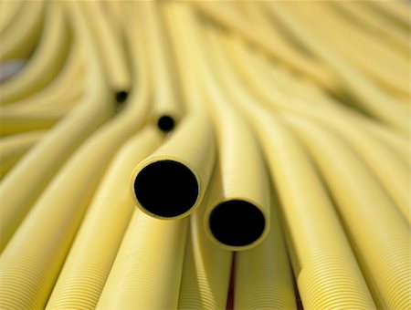 pipework - Yellow plastic pipes in a heap Foto de stock - Super Valor sin royalties y Suscripción, Código: 400-05270127