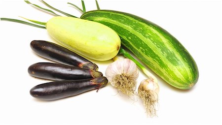 fresh vegetables from bed on white background Stock Photo - Budget Royalty-Free & Subscription, Code: 400-05270353