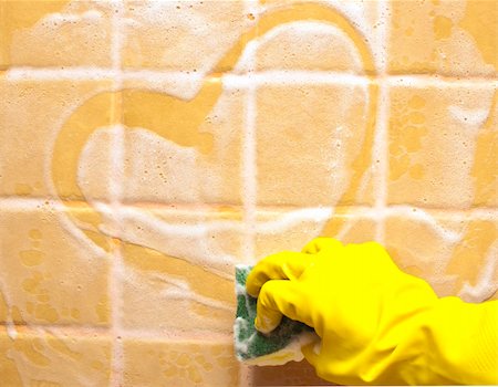 hand in yellow rubber glove draws heart Fotografie stock - Microstock e Abbonamento, Codice: 400-05270401