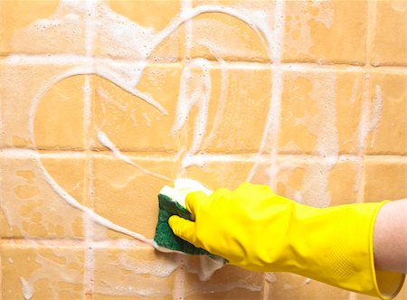 hand in yellow rubber glove draws heart Foto de stock - Super Valor sin royalties y Suscripción, Código: 400-05270403