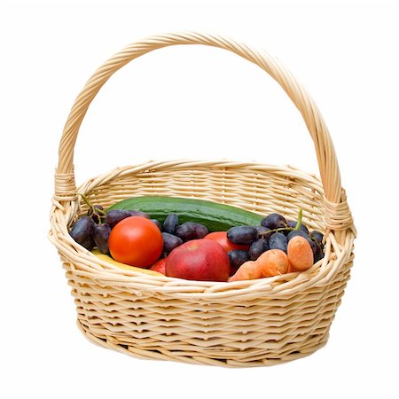 Vegetables and fruits in a basket. Isolated on white. Photographie de stock - Aubaine LD & Abonnement, Code: 400-05270601