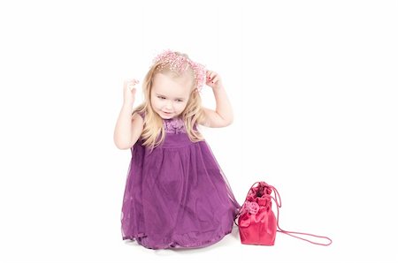 simsearch:400-06517383,k - Studio shot of baby girl in lilac gala dress Fotografie stock - Microstock e Abbonamento, Codice: 400-05272416