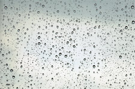 dew drops on glass - Rain drops on a windowpane Stock Photo - Budget Royalty-Free & Subscription, Code: 400-05272811