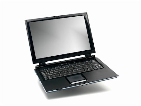 simsearch:400-05125337,k - A laptop computer isolated against a white backgroun d Foto de stock - Super Valor sin royalties y Suscripción, Código: 400-05272868