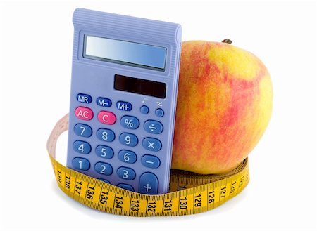 Apple with measuring tape calculator isolated on white background Stock Photo - Budget Royalty-Free & Subscription, Code: 400-05273105