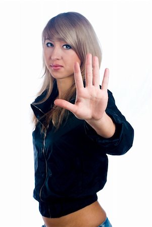 simsearch:400-04049823,k - Young woman motioning to stop, focus on hand. Foto de stock - Royalty-Free Super Valor e Assinatura, Número: 400-05273391