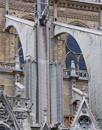 simsearch:400-06201865,k - This telephoto shot of the buttresses of the Notre Dame Cathedral was taken in Paris, France. Fotografie stock - Microstock e Abbonamento, Codice: 400-05273687