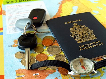 simsearch:400-09186100,k - Canada passport with travel necessities on the map Stock Photo - Budget Royalty-Free & Subscription, Code: 400-05273708