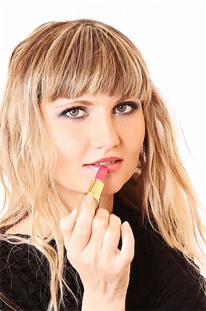 simsearch:400-05314365,k - beautiful young girl making up her lips with lipstick Foto de stock - Royalty-Free Super Valor e Assinatura, Número: 400-05273780