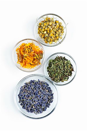 Bowls of dry medicinal herbs on white background from above Photographie de stock - Aubaine LD & Abonnement, Code: 400-05273833