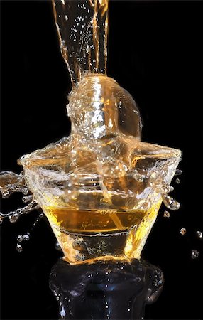 Perfume bottle on water splash Stock Photo - Budget Royalty-Free & Subscription, Code: 400-05273954