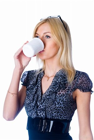 simsearch:400-04188263,k - Businesswoman with coffee cup during coffee break Foto de stock - Super Valor sin royalties y Suscripción, Código: 400-05284195