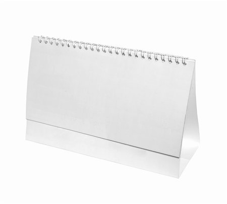 financial meeting tablet - close up of a desk calendar on white background with clipping path Stock Photo - Budget Royalty-Free & Subscription, Code: 400-05284347