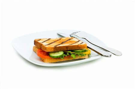 simsearch:400-07099478,k - Toasted bread with filling isolated on the white Stock Photo - Budget Royalty-Free & Subscription, Code: 400-05284611