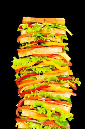 simsearch:400-07099478,k - Tall sandwich isolated on the black background Stock Photo - Budget Royalty-Free & Subscription, Code: 400-05284621