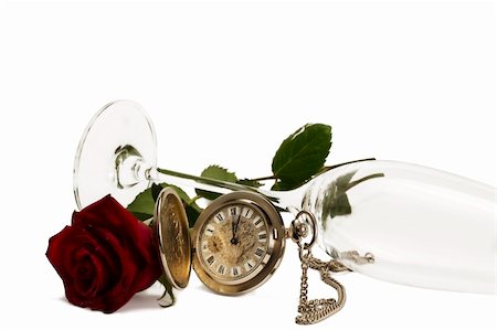 simsearch:600-01551669,k - old pocket watch with a red wet rose under a lying champagne glass on white background Stock Photo - Budget Royalty-Free & Subscription, Code: 400-05284932