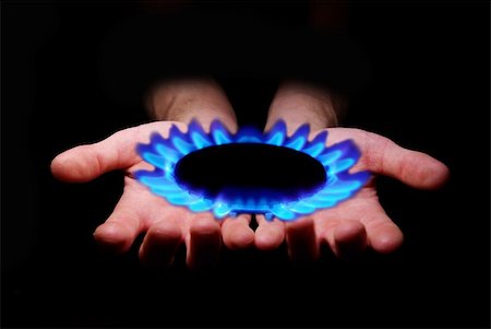 flame of methane gas stove - ðands holding a flame gas Stock Photo - Budget Royalty-Free & Subscription, Code: 400-05285433