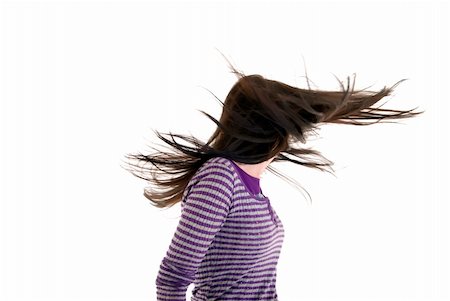 simsearch:400-04267059,k - Portrait of a young brunette with her hair blowing out Photographie de stock - Aubaine LD & Abonnement, Code: 400-05285518