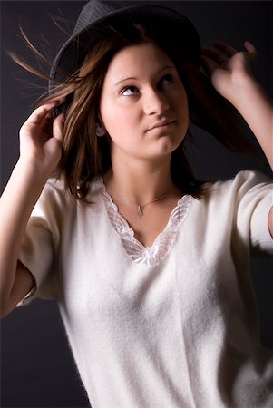 simsearch:400-04267059,k - Portrait of a young seductive brunette in hat Photographie de stock - Aubaine LD & Abonnement, Code: 400-05285553