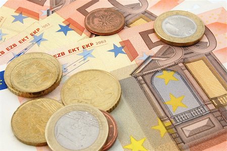 simsearch:400-07087821,k - macro of euro bills and coins can be used as background Stock Photo - Budget Royalty-Free & Subscription, Code: 400-05285609