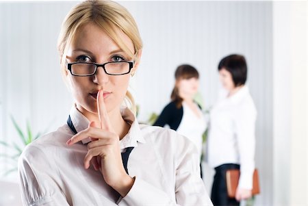 simsearch:400-04238180,k - Woman with a Keep it quiet expression in office Stockbilder - Microstock & Abonnement, Bildnummer: 400-05285715