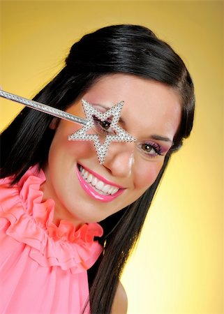 simsearch:400-08152621,k - Beautiful woman with creative make-up and the star making a wish. focus on star Fotografie stock - Microstock e Abbonamento, Codice: 400-05285726