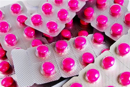 pink science - pack of pink medicine pills background Stock Photo - Budget Royalty-Free & Subscription, Code: 400-05286811