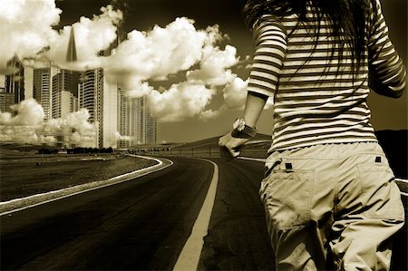 shanghai freeways - girl running outdoor with the  background of the road and city . Stock Photo - Budget Royalty-Free & Subscription, Code: 400-05287021