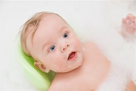 Beauty happy baby boy having bath with foam Stock Photo - Budget Royalty-Free & Subscription, Code: 400-05287296