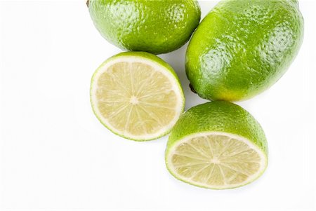 simsearch:693-08127360,k - ripe lime isolated on a white background Photographie de stock - Aubaine LD & Abonnement, Code: 400-05287301