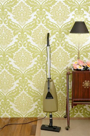 Retro vacuum cleaner vintage sixties room green wallpaper Stock Photo - Budget Royalty-Free & Subscription, Code: 400-05287661