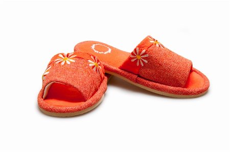 floor heat - orange slippers isolated on white Stock Photo - Budget Royalty-Free & Subscription, Code: 400-05287813