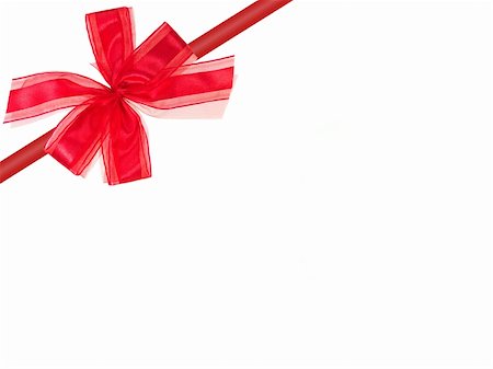 A red bow isolated against a white background Stock Photo - Budget Royalty-Free & Subscription, Code: 400-05288091